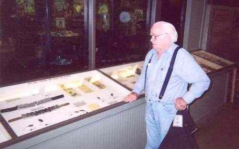 Clyde A. Harbin at Rick Collins display of the "Bassman" spinner Baits at the Sportsman Warehouse Fish Tank