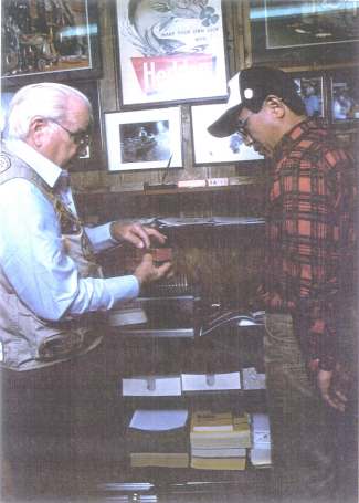 Mr. Harbin and Mr. Sato are inspecting some rare 1904/1905 Heddon lures along with the lure boxes.