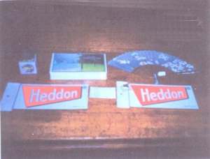 He presented Mr. and Mrs. Harbin with these fine gifts which he brought with him from Japan.  The gifts included a Japanese boxed  fan, Pokemon boxed cards, two Smith Co. Ltd Heddon cards and a video tape the Last Summer 1997 by Shizuo Hatori.