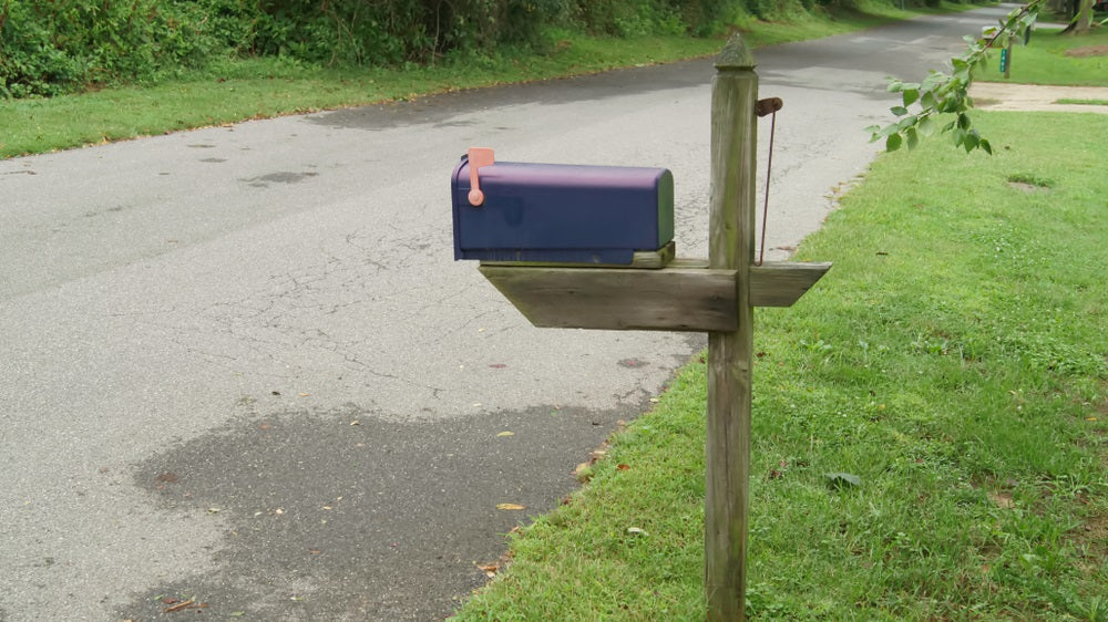 Mail Box with a wet street