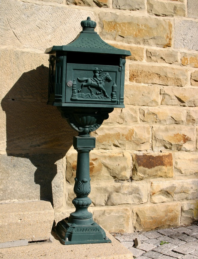 Old-fashioned green mailbox