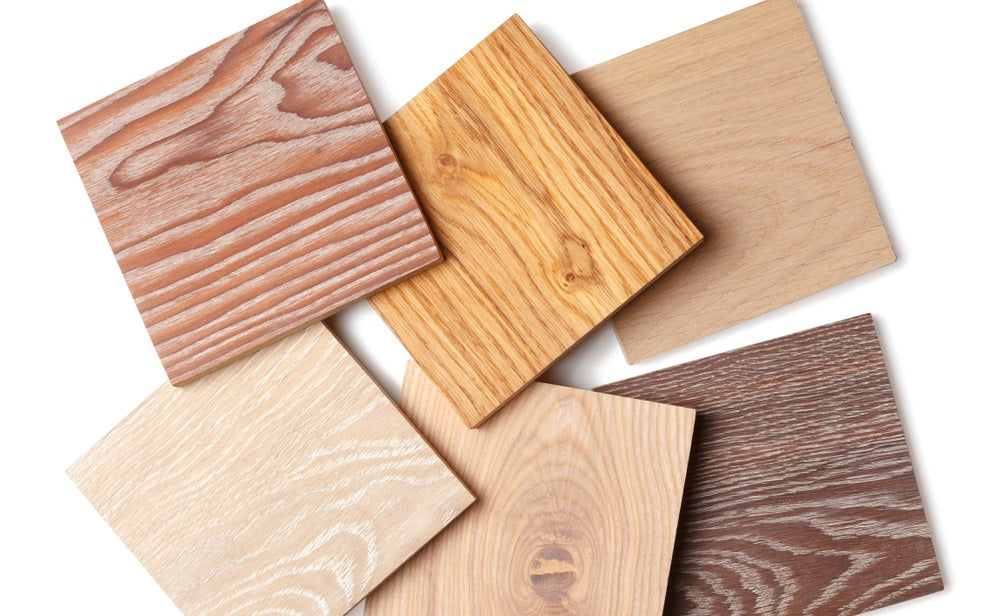 group of eight small samples of wooden parquet from different types of wood