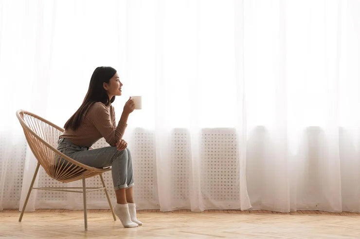 young-girl-sitting-modern-chair-enjoying-coffee_116547-38262.webp__PID:0f97f22e-11e1-477d-ad11-088dedb9ca68