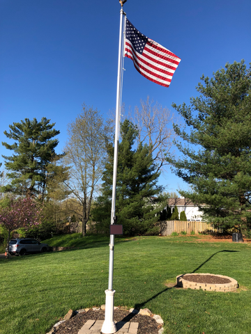 20' flagpole in backyard without plant
