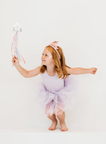 little girl in lavender tank tutu leotard