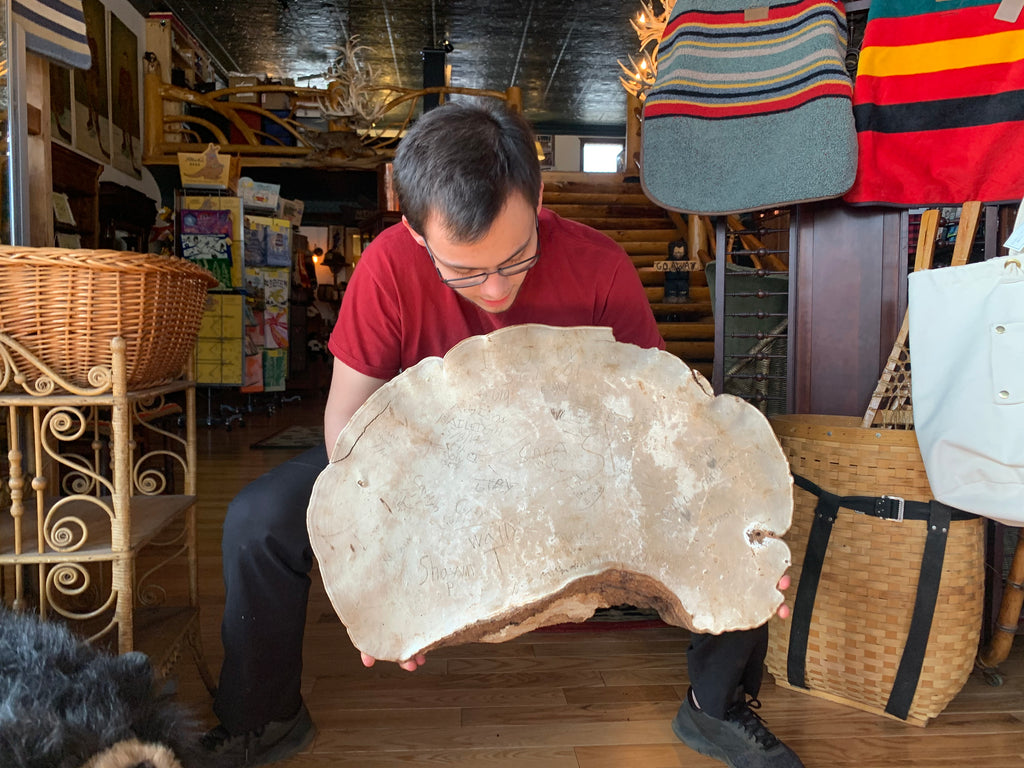 Garrett Kopp holding a large artist conk mushroom