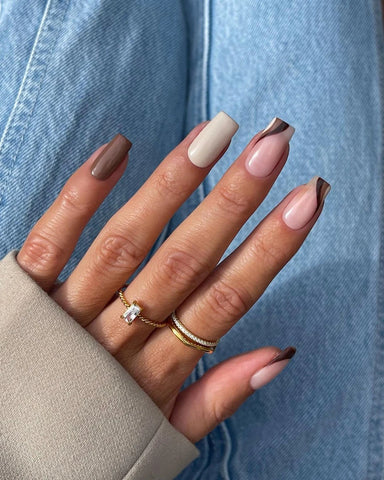 nail inspiration with ring stacks