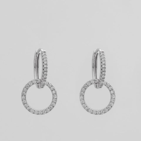 Silver Huggies Lookbook 2022: Interlocking silver huggie earrings