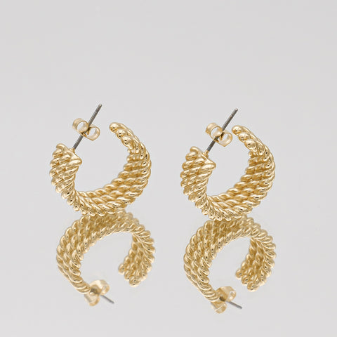 Twisted gold half-hoop-earrings - Hoop Earring Trends 2022