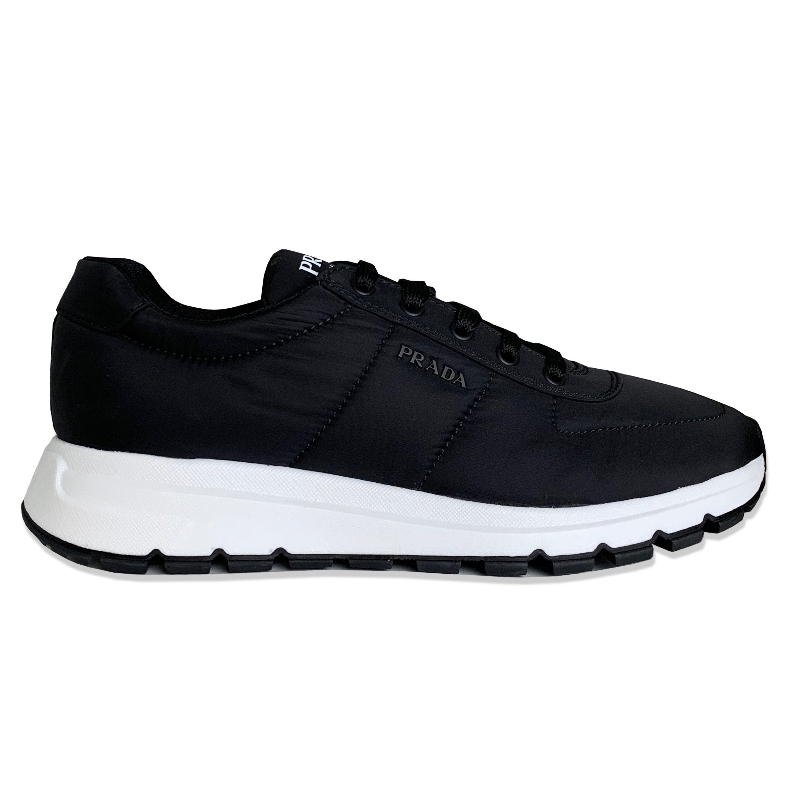 prada runners black and white