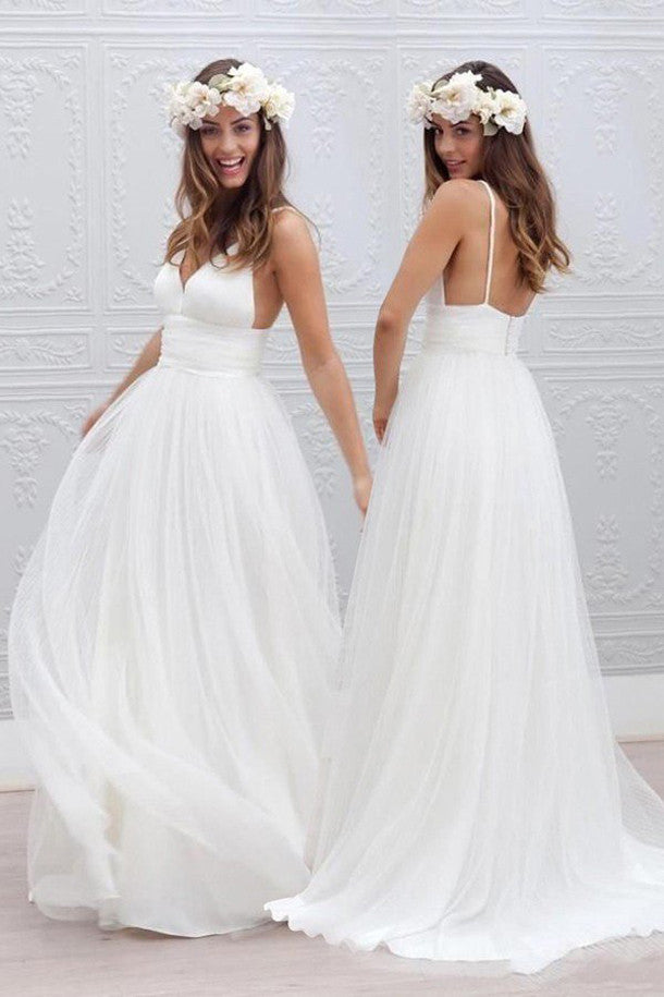 simple white flowy wedding dress