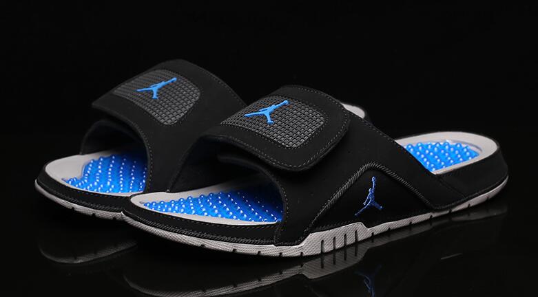 white and blue jordan sandals