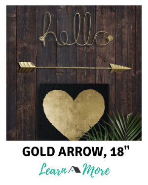 single gold arrow wall decor