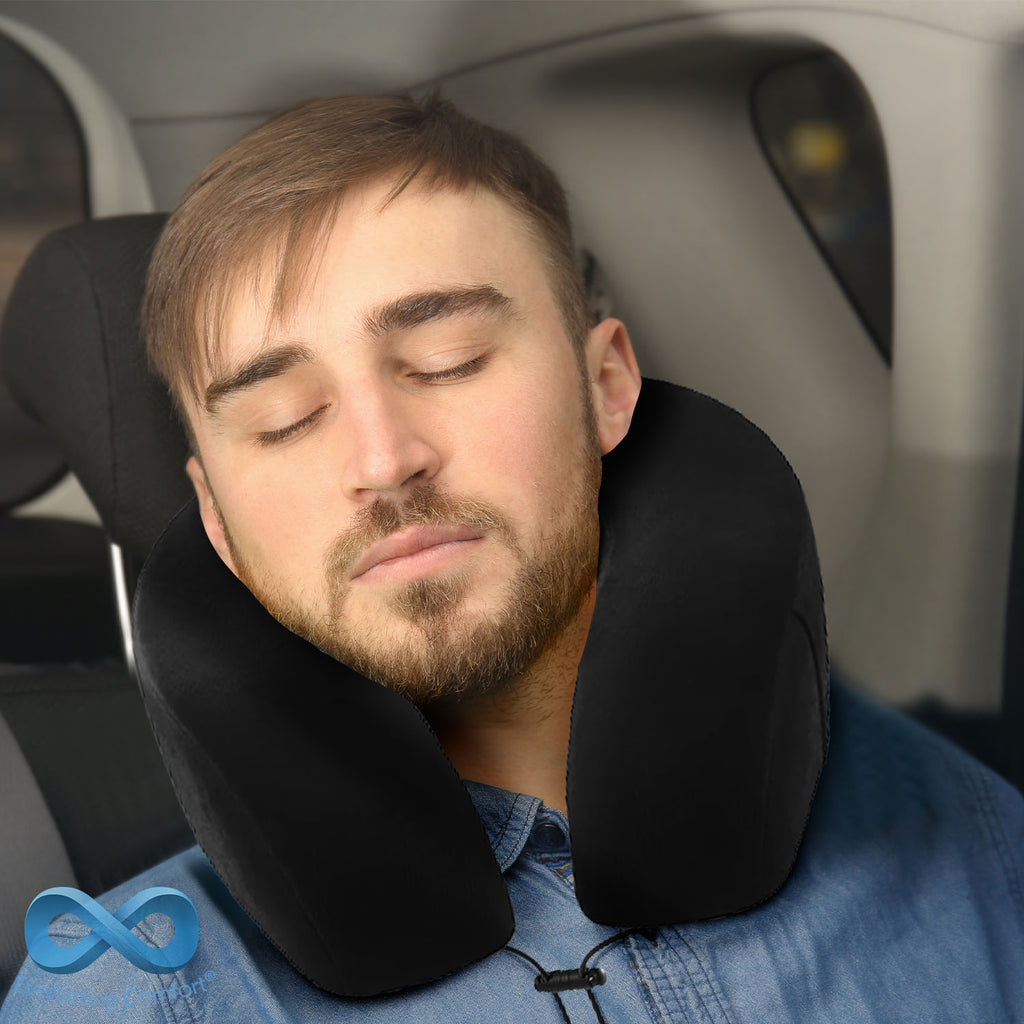 young man sleeping in the car