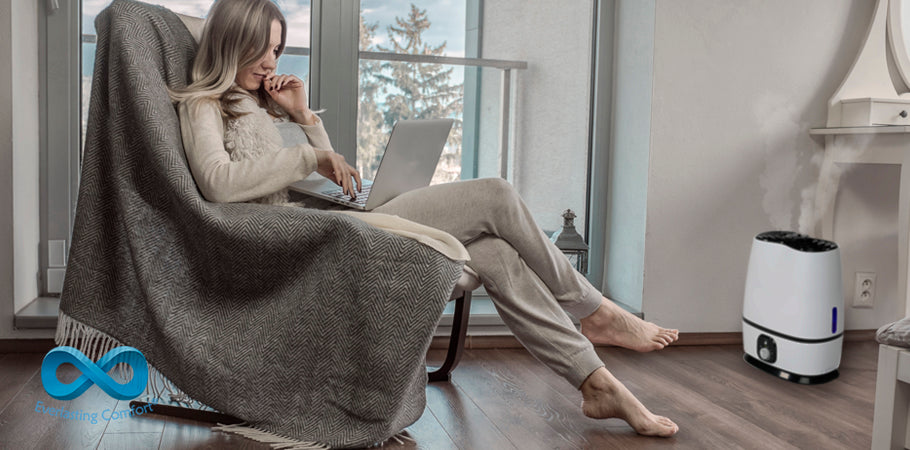 girl sitting in a chair with a laptop