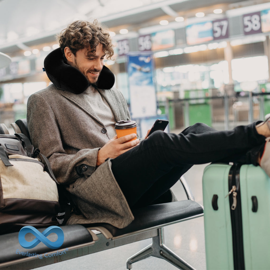 happy man at the airport waiting for a flight