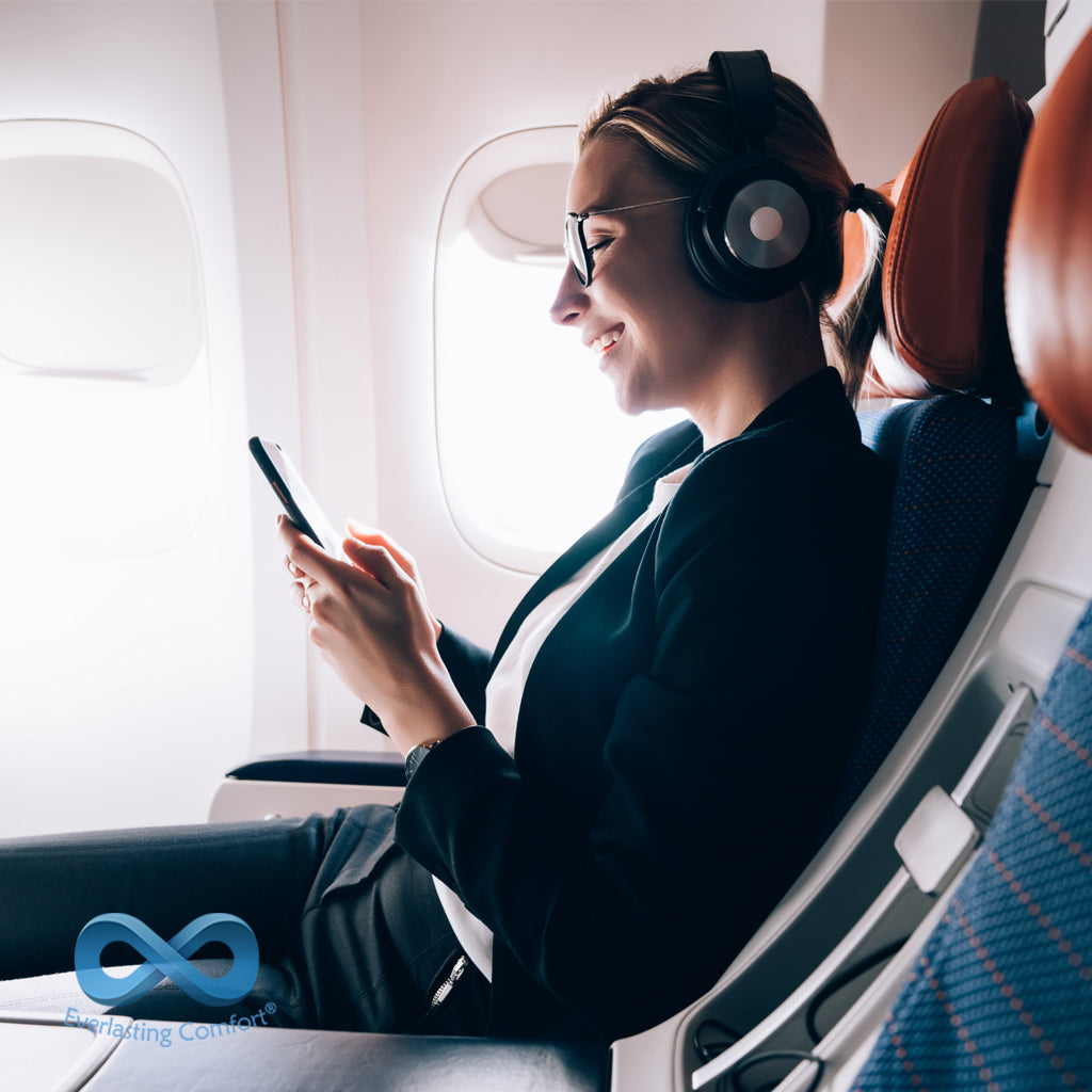 girl listening to music on the plane