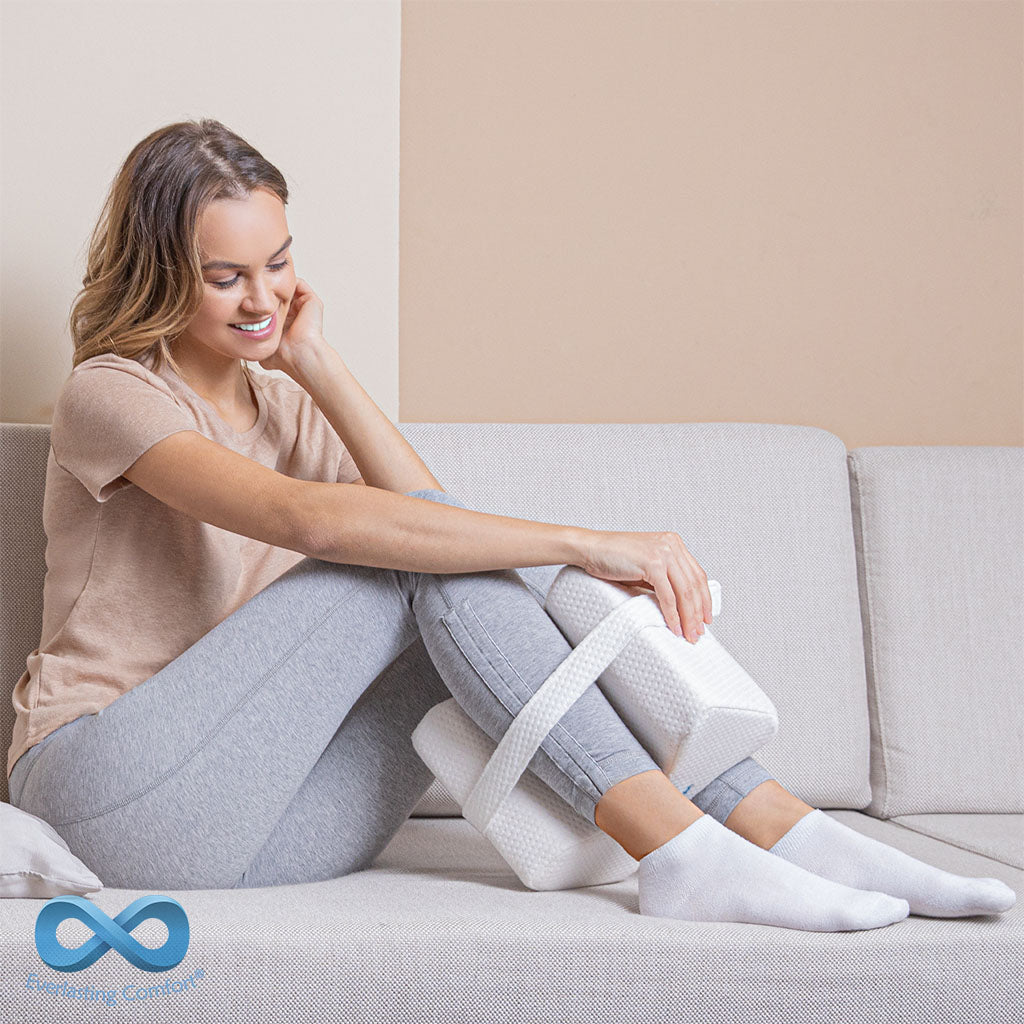 girl on the couch with a knee pillow