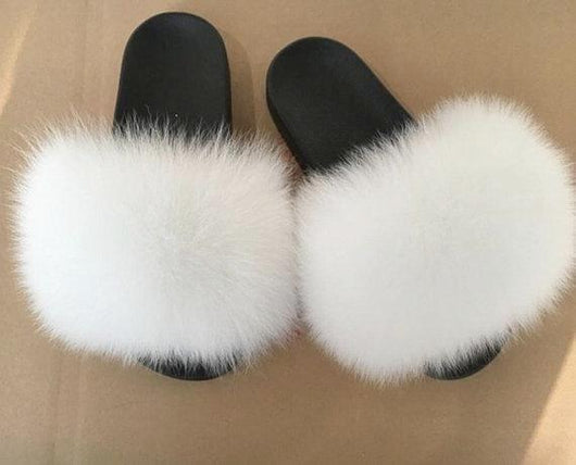 white fox fur slides