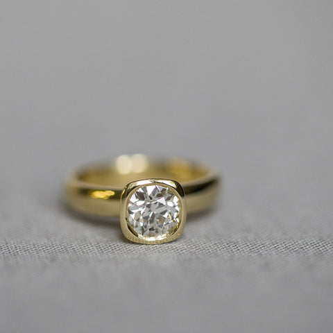 chunky yellow gold bezel engagement ring