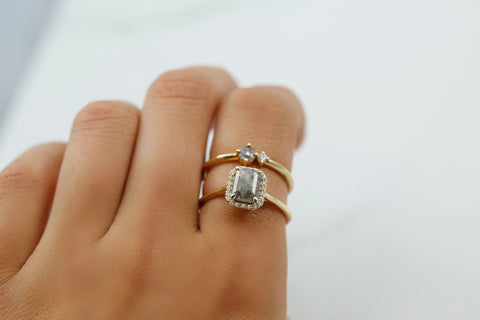 gray diamond ring paired with gray and white diamond stack ring yellow gold metal right hand rings or engagement rings