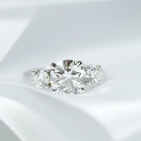 white gold solitaire three stone diamond custom engagement ring