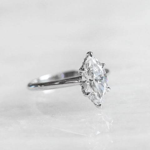 custom platinum and marquise shaped diamond engagement ring prong set