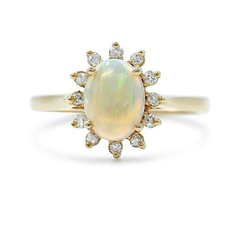 14k yellow gold opal estate ring with a white diamond halo