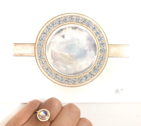 moonstone gemstone ring with diamonds and a yellow gold band in a watercolor painting