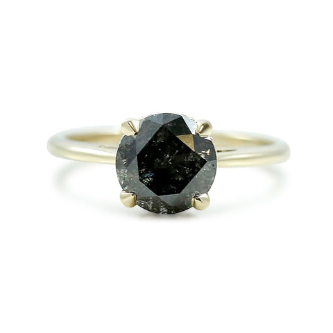 round galaxy diamond engagement ring prong set with a hidden white diamond halo and yellow gold band