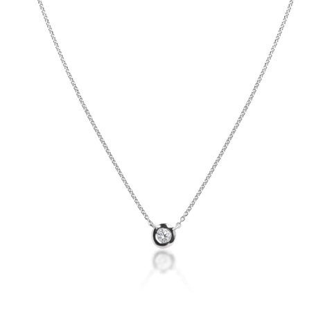 a bezel set white diamond necklace 