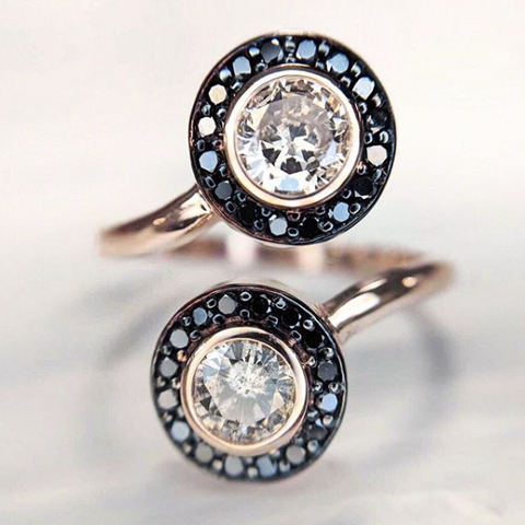 Modern right hand ring jewelry redesign. Created with two diamond studs, rose gold and black diamonds. 