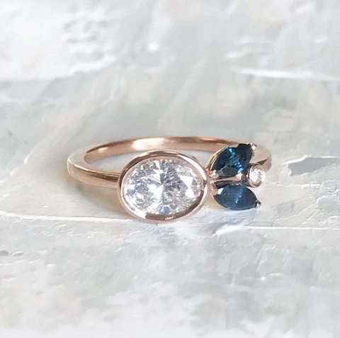 Custom engagement ring created with heirloom sapphires.