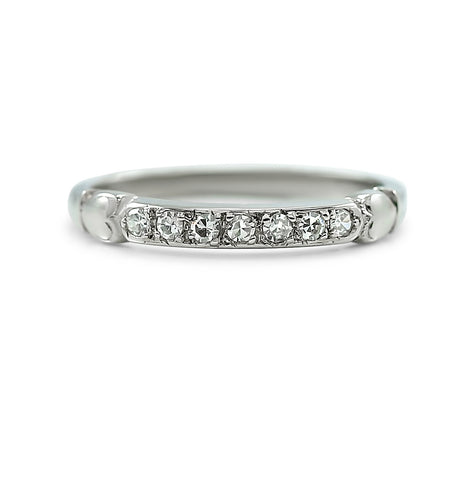 14k white gold estate diamond wedding band with heart details