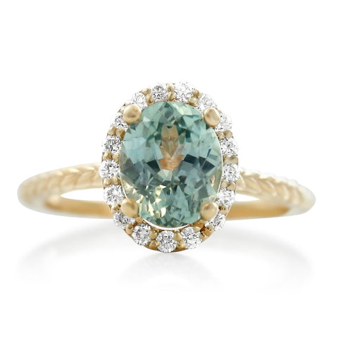 aquamarine right hand ring with diamond halo and yellow gold braided band