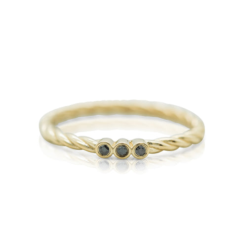 yellow gold braided band and black diamond three stone stack rings