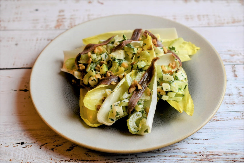 Endives salad with anchovy and manchego