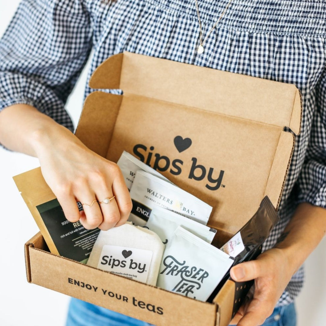 Shop the Best Loose Leaf Tea Shop at Sips by picture of opening a Sips by Box