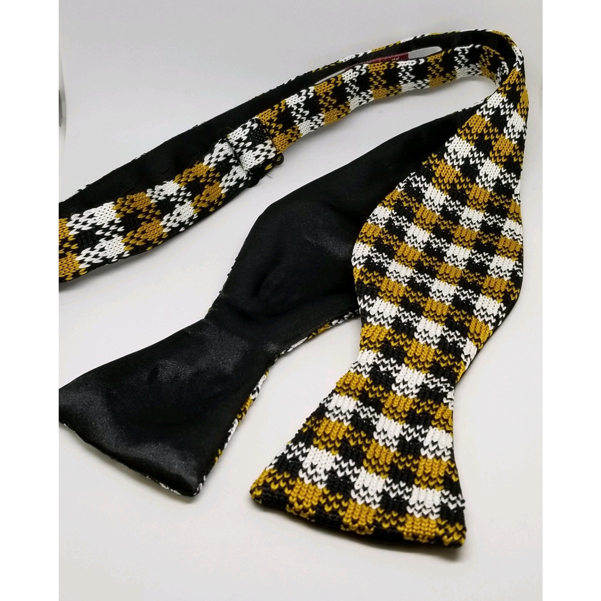 black and gold bow tie