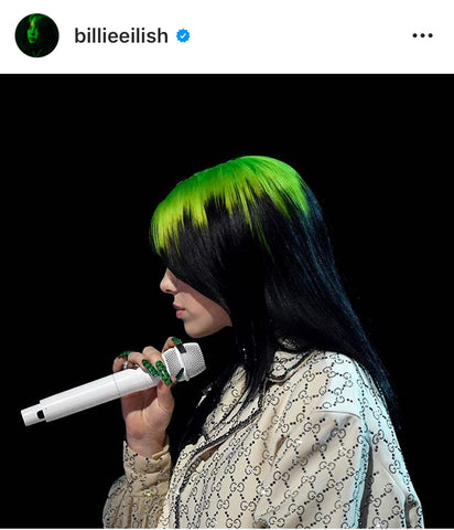 Lime green hair roots on Billie Eilish