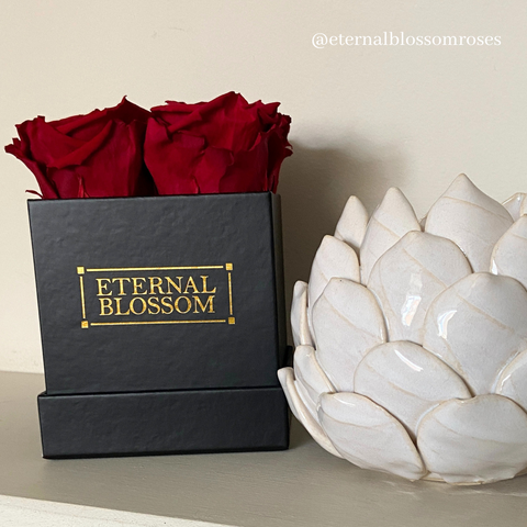 eternal blossom infinity roses on a shelf