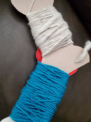 White and turquoise spun yarn