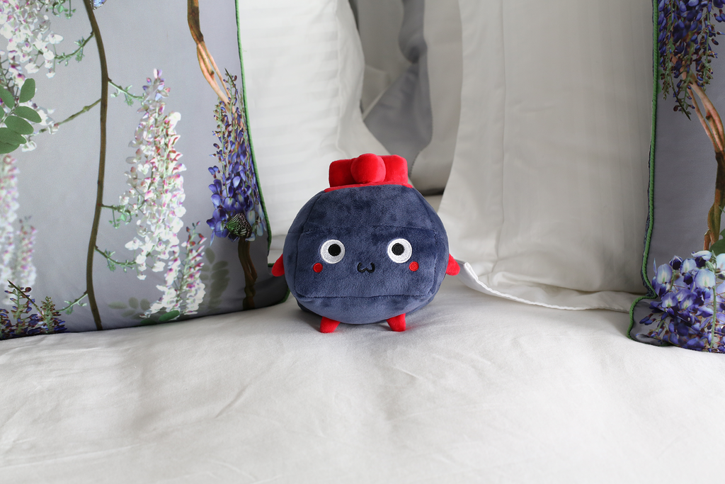 Blue and red plushie of a keyboard switch