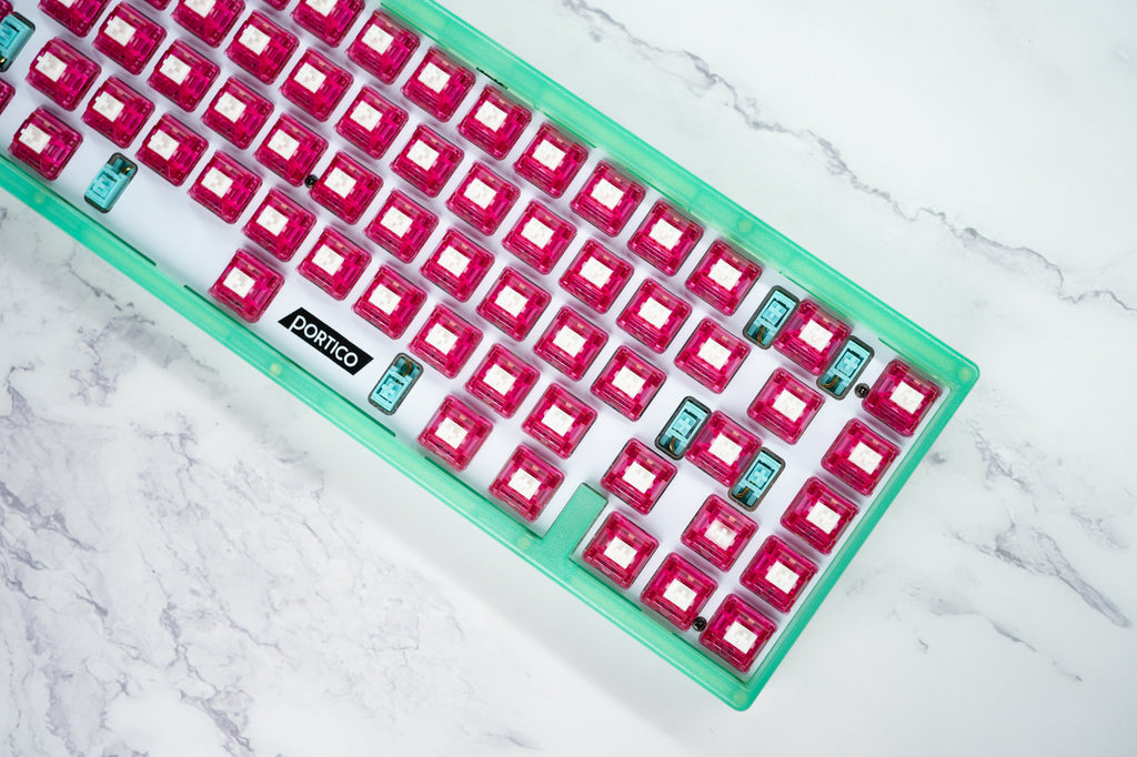 Portico keyboard with dragon fruit switches.