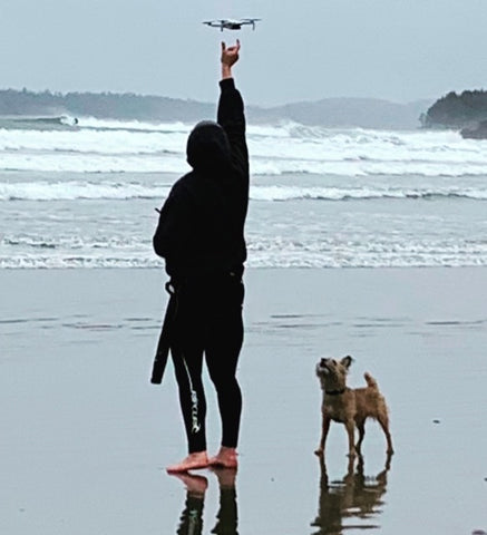 using a drone on the beach in Cox Bay