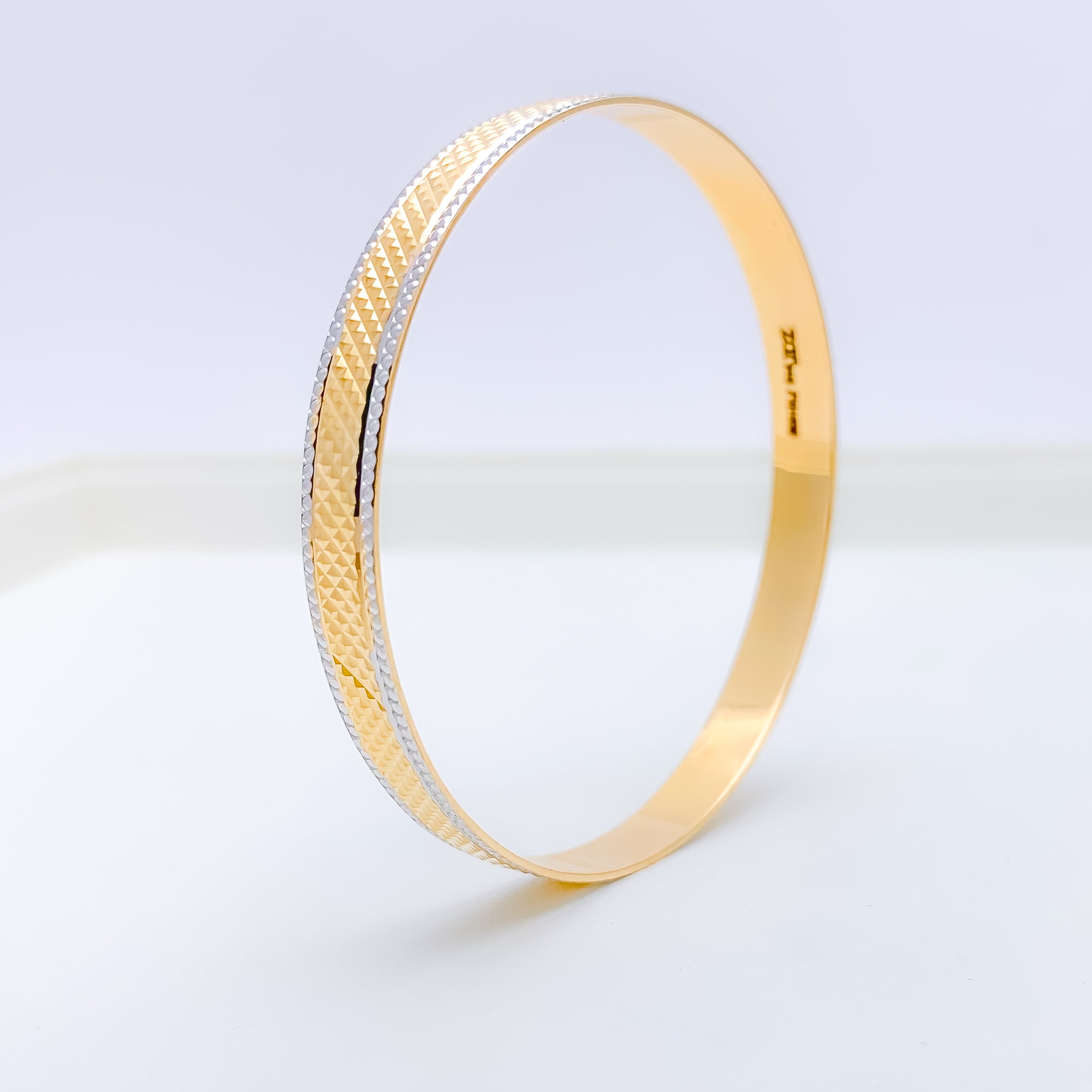 Sleek Embossed Two-Tone Bangle