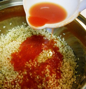 pour sauce to the risotto
