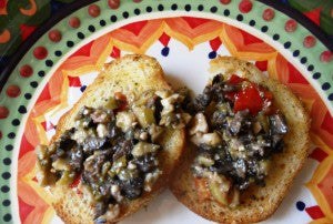 Bruschetta with black olive pesto