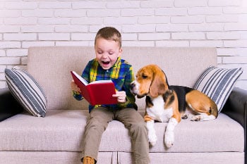 boy-reading-to-dog