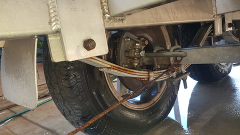 This photo shows the type of maintenance required on a boat trailer
